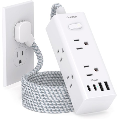 One Beat white slim power strip with six outlets, two USB-C and two USB-A ports, plugged into a wall outlet