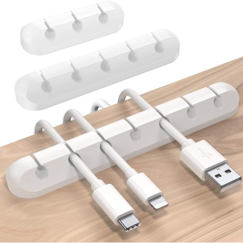 SOULWIT white silicone cable holder clips in 3-, 5-, and 7-slot sizes holding charging cables on a desk